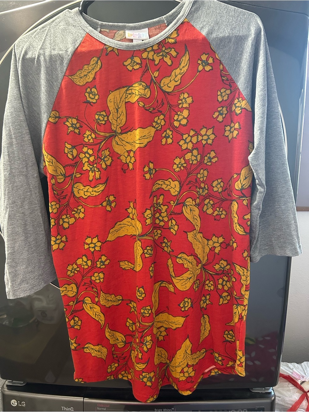 LuLaRoe Red and Yellow Floral Raglan Top